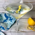 Lemon twist or olive (for garnish)